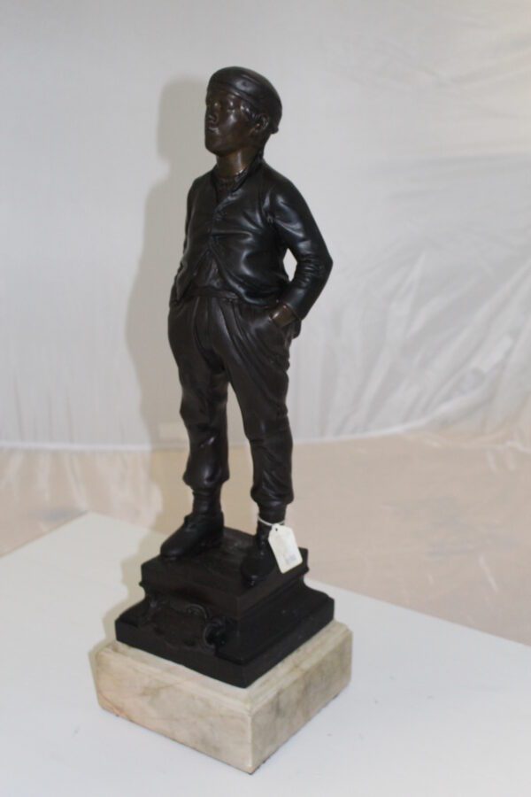 Boy standing Bronze Statue -  Size: 7.5"L x 7.5"W x 23.5"H.