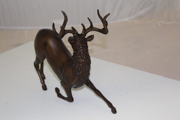 Deer Bronze Statue -  Size: 12"L x 5"W x 10.5"H.