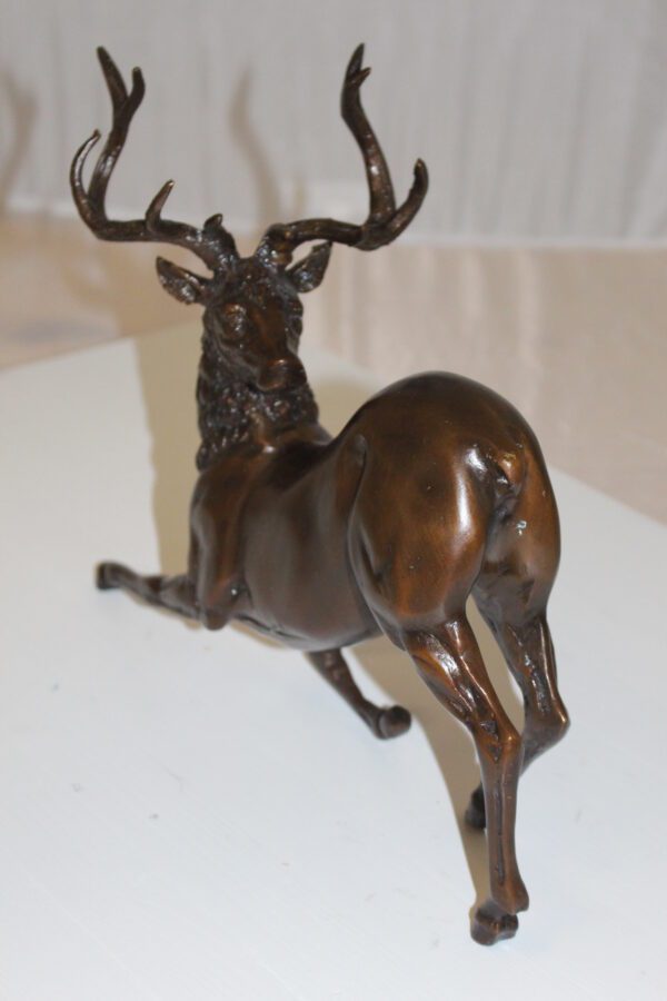 Deer Bronze Statue -  Size: 12"L x 5"W x 10.5"H.