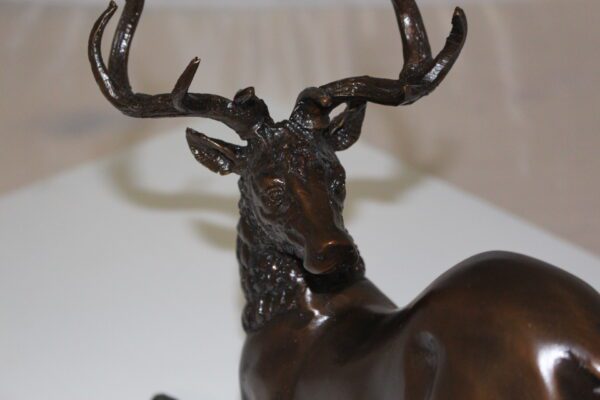 Deer Bronze Statue -  Size: 12"L x 5"W x 10.5"H.