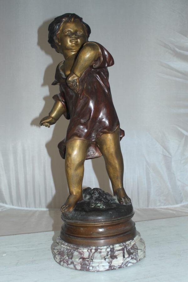 Boy standing Bronze Statue on Marble base -  Size: 10"L x 12"W x 26"H.