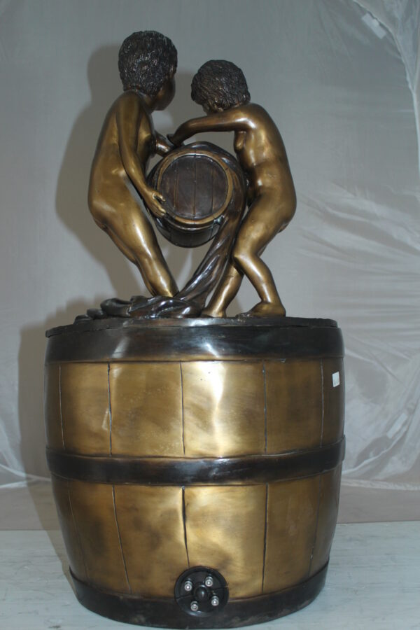 Two boys on a bucket self-contained fountain bronze statue -  16" x 16" x 29"H.