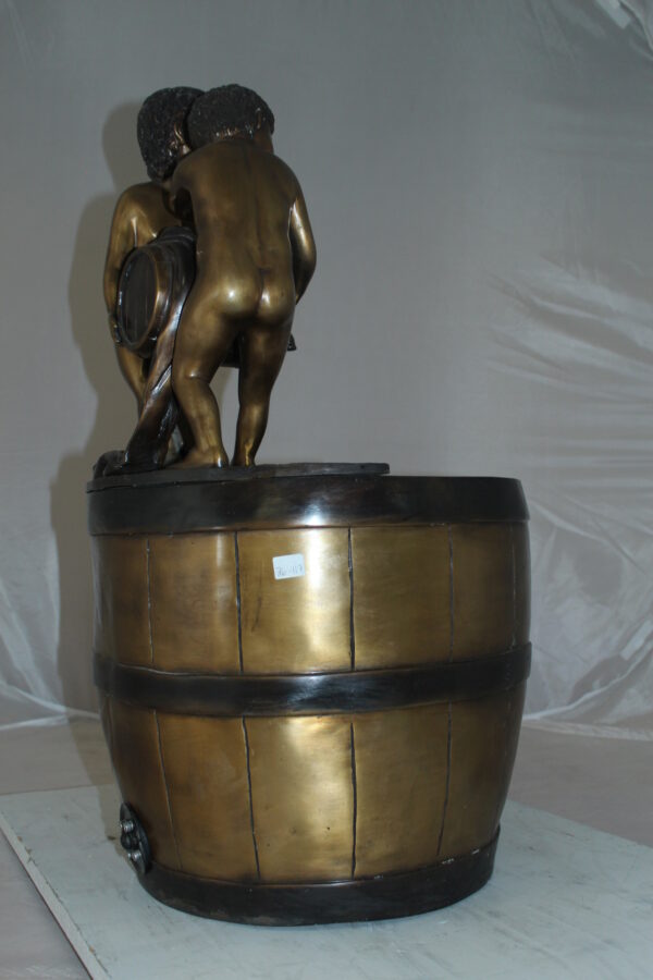 Two boys on a bucket self-contained fountain bronze statue -  16" x 16" x 29"H.