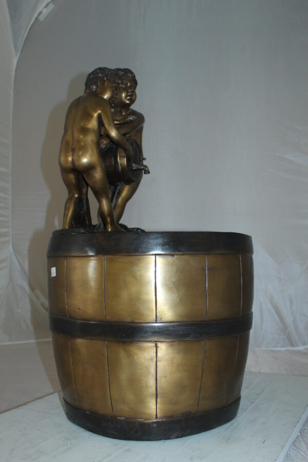 Two boys on a bucket self-contained fountain bronze statue -  16" x 16" x 29"H.