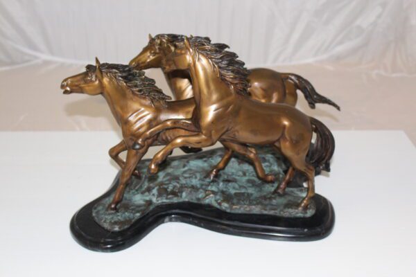 Four horses running Bronze Statue -  Size: 20"L x 14"W x 12"H.