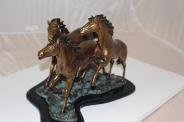 Four horses running Bronze Statue -  Size: 20"L x 14"W x 12"H.