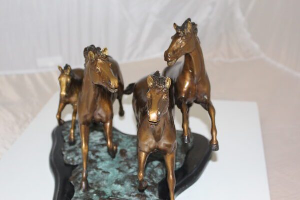 Four horses running Bronze Statue -  Size: 20"L x 14"W x 12"H.