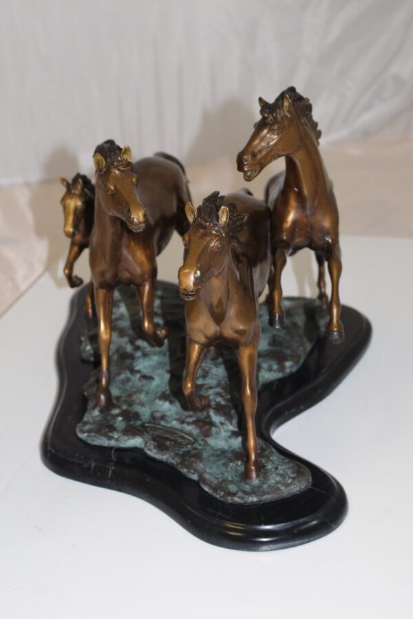 Four horses running Bronze Statue -  Size: 20"L x 14"W x 12"H.