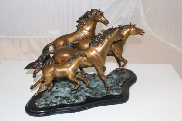 Four horses running Bronze Statue -  Size: 20"L x 14"W x 12"H.