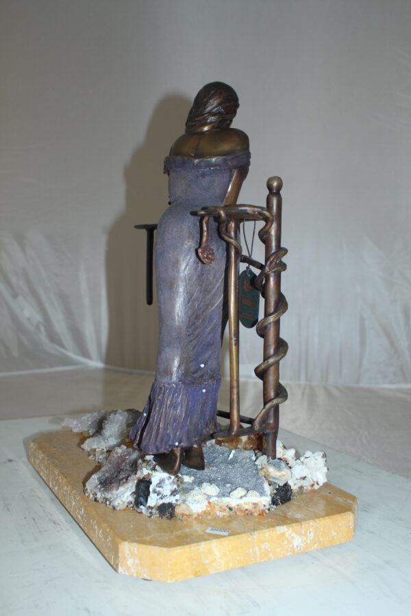 Judith Bronze Statue on Amethyst stone by Vidal -  Size: 16"L x 10"W x 18"H.
