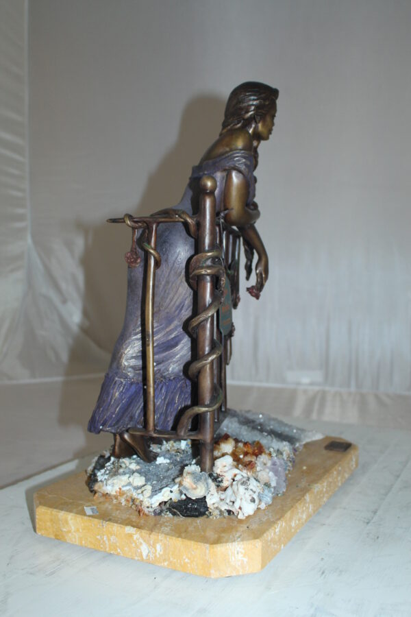 Judith Bronze Statue on Amethyst stone by Vidal -  Size: 16"L x 10"W x 18"H.
