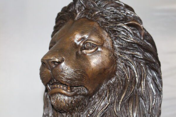 Lion Sitting on Base Bronze Statue -  Size: 13"L x 13"W x 34"H.