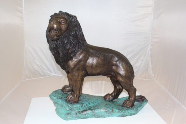 Lion Standing Bronze Statue -  Size: 26"L x 10"W x 25"H.