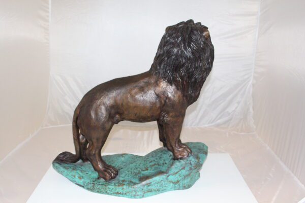 Lion Standing Bronze Statue -  Size: 26"L x 10"W x 25"H.