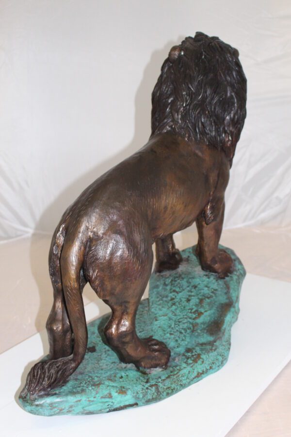 Lion Standing Bronze Statue -  Size: 26"L x 10"W x 25"H.