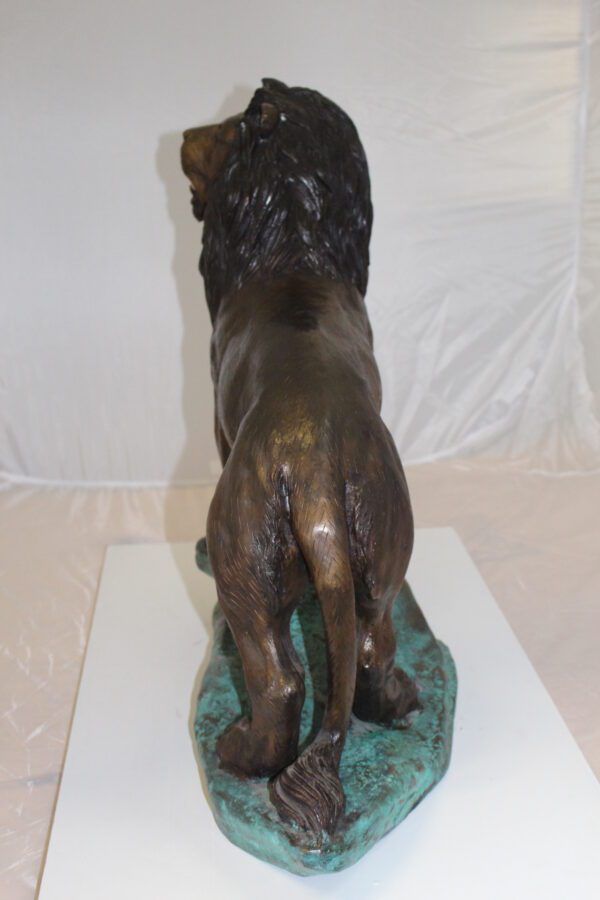 Lion Standing Bronze Statue -  Size: 26"L x 10"W x 25"H.