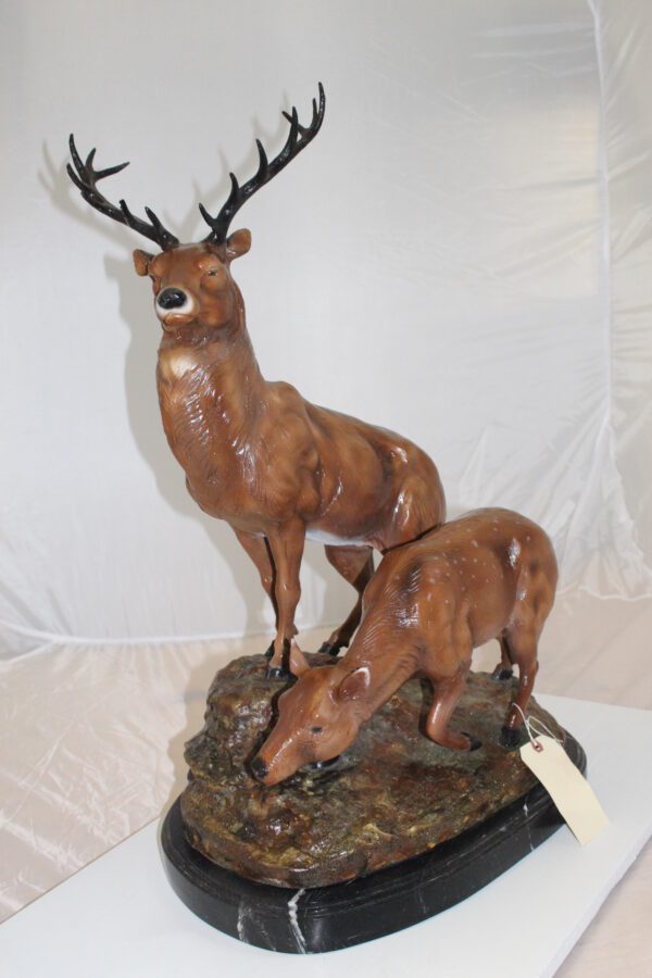 Two Deers Bronze Statue -  Size: 21"L x 13"W x 32"H.