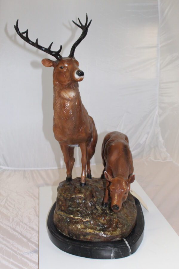 Two Deers Bronze Statue -  Size: 21"L x 13"W x 32"H.