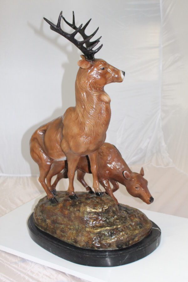 Two Deers Bronze Statue -  Size: 21"L x 13"W x 32"H.