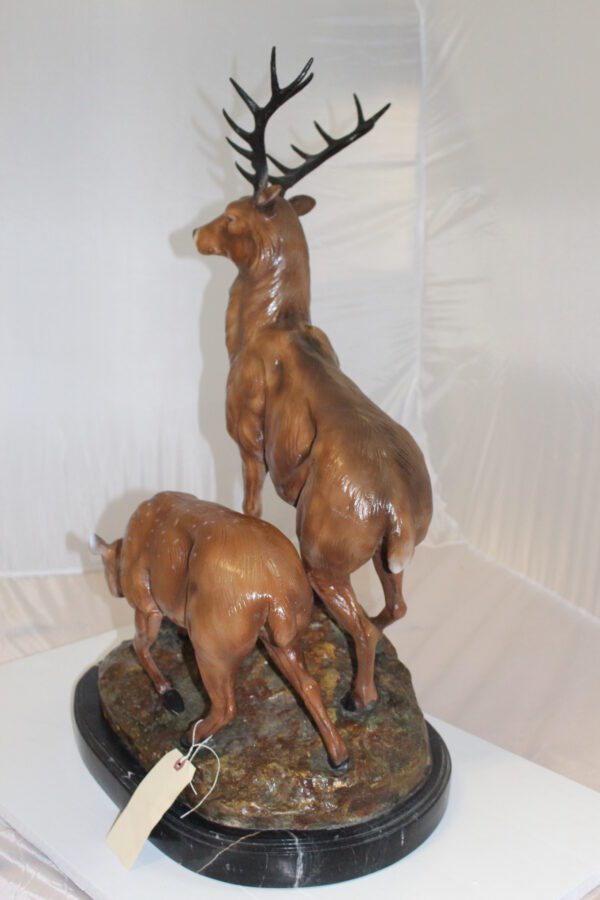 Two Deers Bronze Statue -  Size: 21"L x 13"W x 32"H.