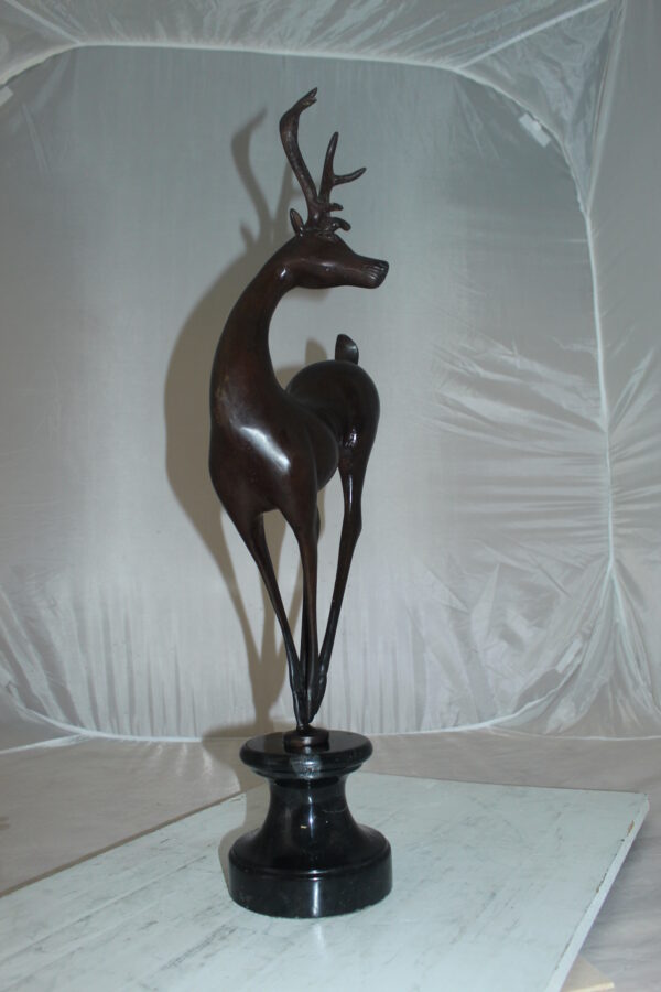 Deer standing Bronze Statue -  Size: 12"L x 7"W x 30"H.