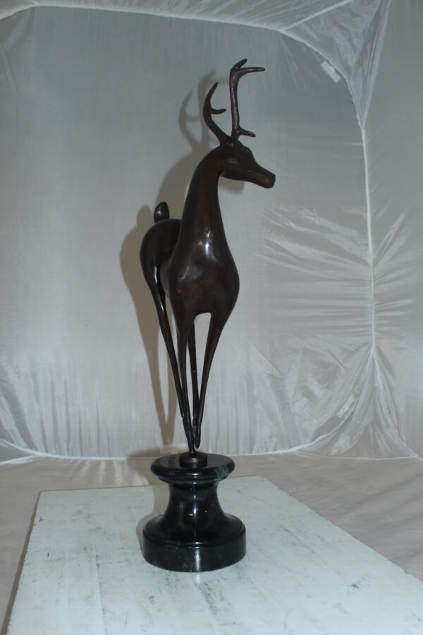 Deer standing Bronze Statue -  Size: 12"L x 7"W x 30"H.