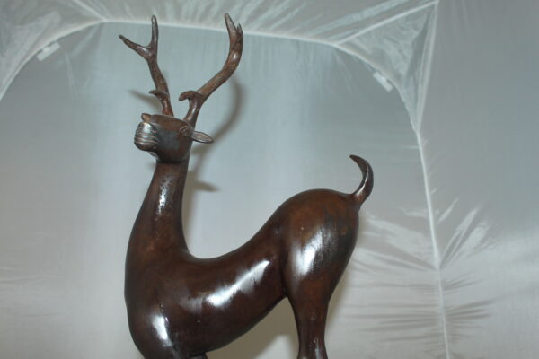 Deer standing Bronze Statue -  Size: 12"L x 7"W x 30"H.