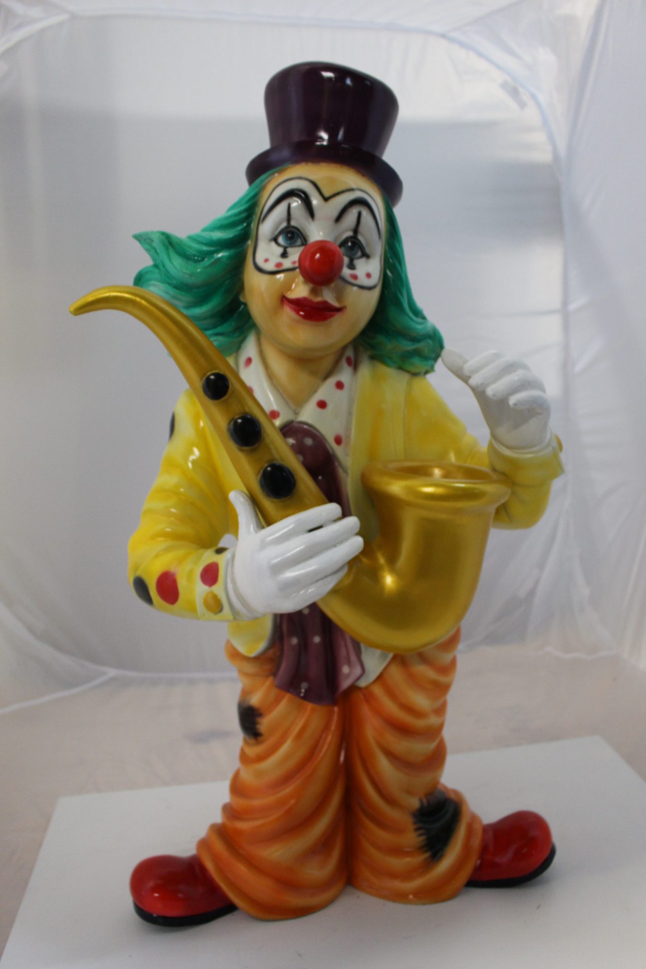 Clown Standing with Saxophone Bronze Statue - Size: 20L x 15W x 36H.