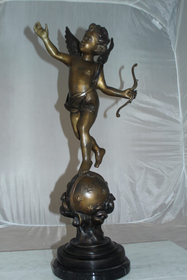 Angel on Earth Bronze Statue -  Size: 10"L x 13"W x 32"H.