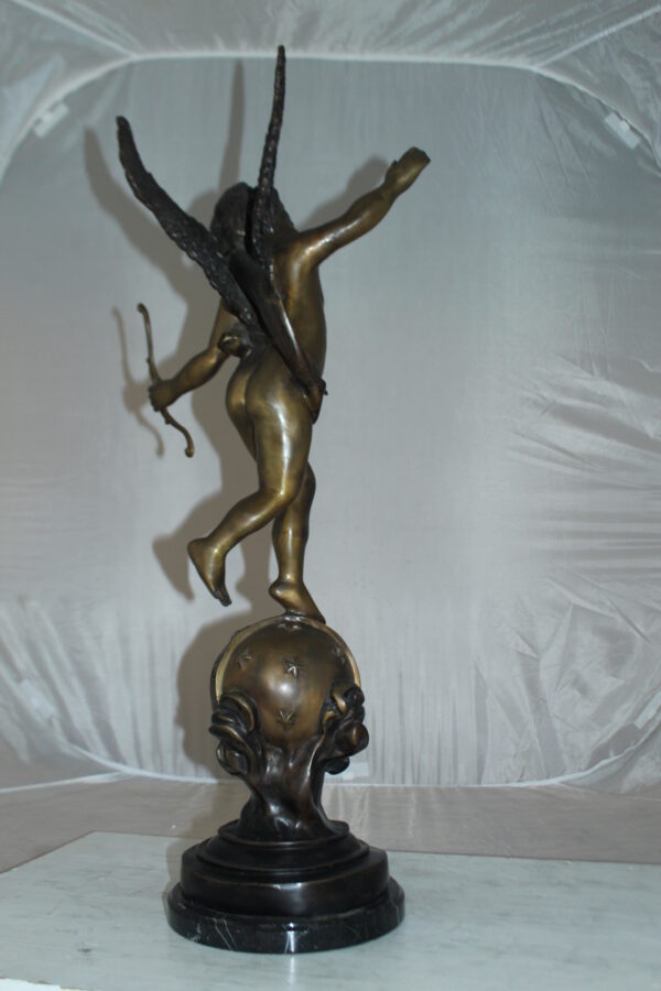 Angel on Earth Bronze Statue -  Size: 10"L x 13"W x 32"H.