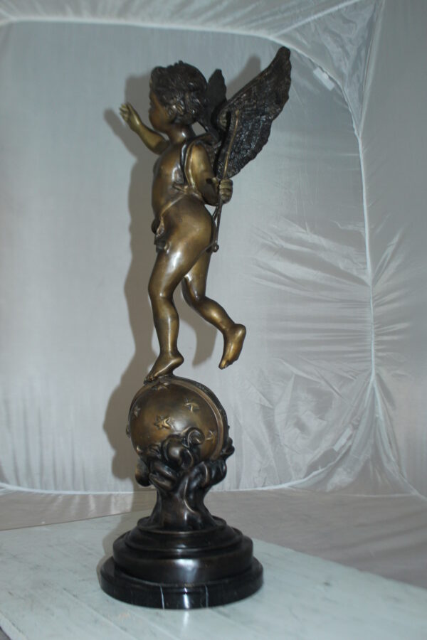 Angel on Earth Bronze Statue -  Size: 10"L x 13"W x 32"H.