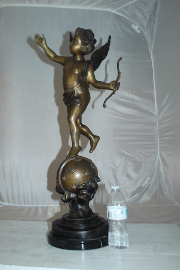 Angel on Earth Bronze Statue -  Size: 10"L x 13"W x 32"H.