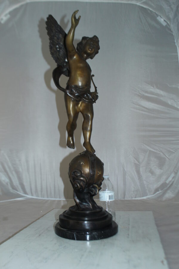 Angel on Earth Bronze Statue -  Size: 10"L x 13"W x 32"H.