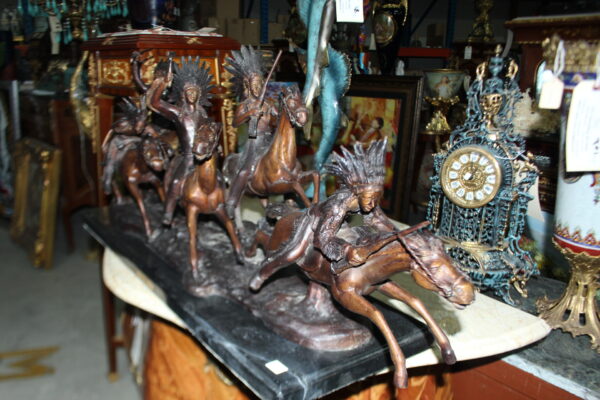 War party Bronze Statue by Carl Cauba -  Size: 39"L x 10"W x 15"H.