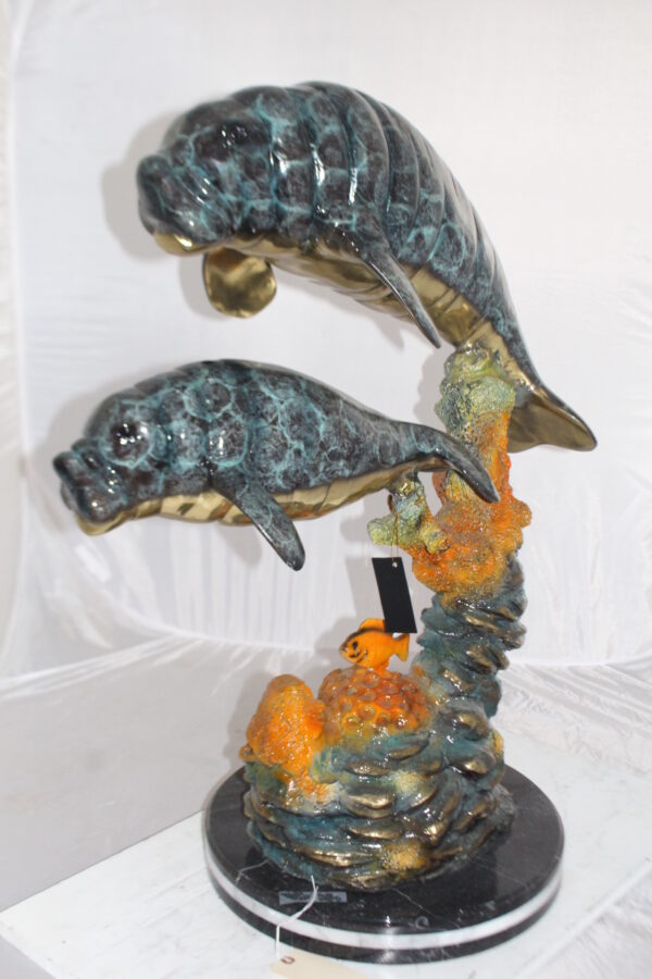 Manatees swimming - large Bronze Statue -  Size: 18"L x 28"W x 38"H.