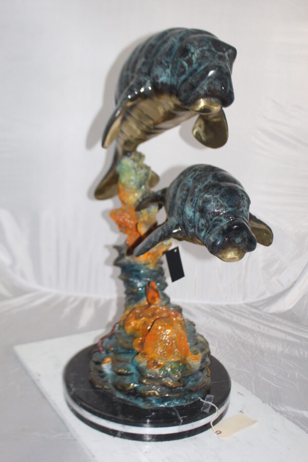 Manatees swimming - large Bronze Statue -  Size: 18"L x 28"W x 38"H.