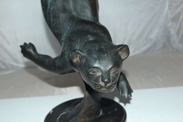 Otter Bronze Statue -  Size: 15"L x 17"W x 44"H.