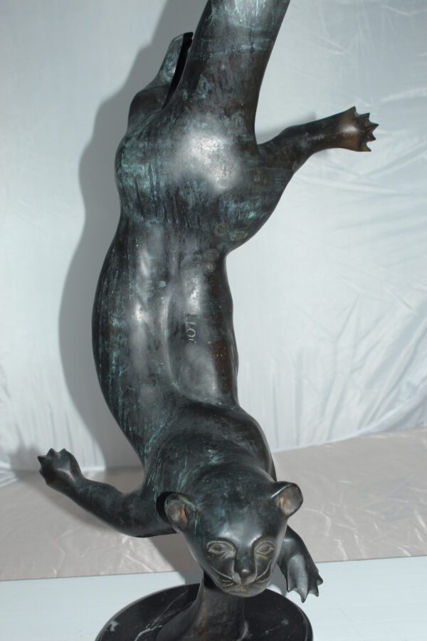 Otter Bronze Statue -  Size: 15"L x 17"W x 44"H.