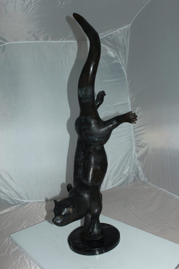 Otter Bronze Statue -  Size: 15"L x 17"W x 44"H.