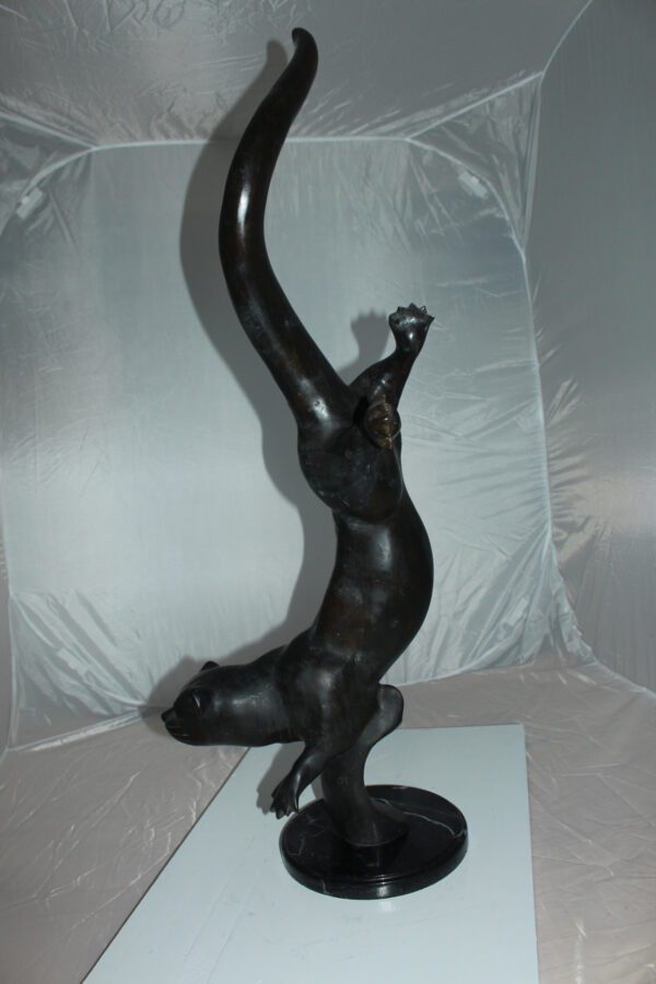 Otter Bronze Statue -  Size: 15"L x 17"W x 44"H.