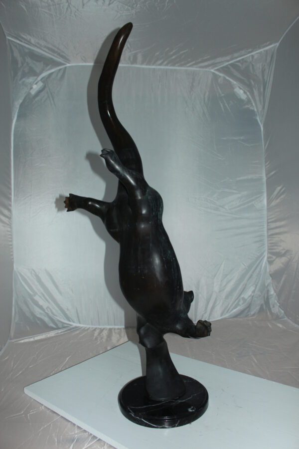 Otter Bronze Statue -  Size: 15"L x 17"W x 44"H.