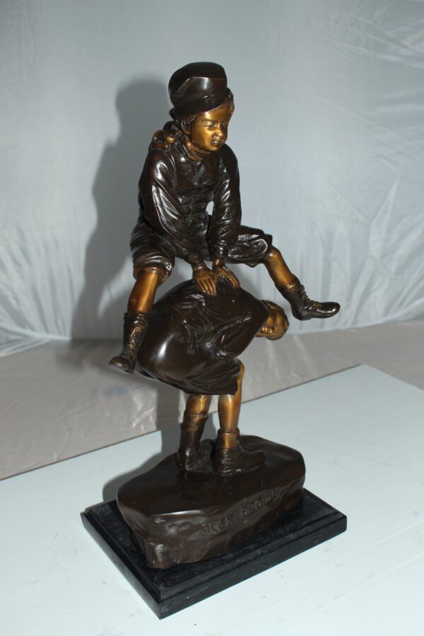 Leapfrog Bronze Statue -  Size: 12"L x 7"W x 19"H.