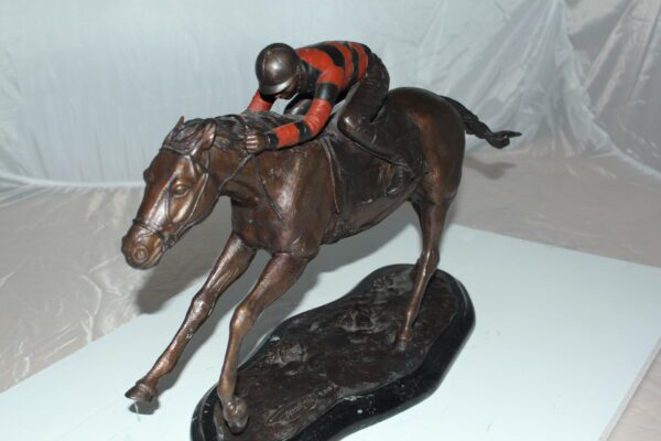 Jockey with Horse -large Bronze Statue -  Size: 21"L x 8"W x 14"H.