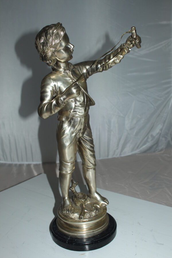 Boy with a Sling Bronze Statue -  Size: 10"L x 6.5"W x 21.5"H.