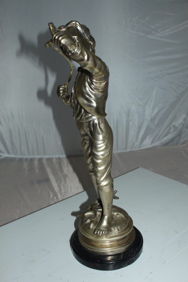 Boy with a Sling Bronze Statue -  Size: 10"L x 6.5"W x 21.5"H.