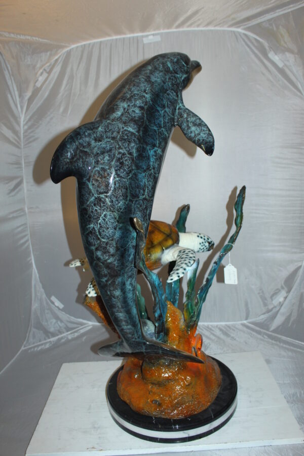 Dolphin with large turtle Bronze Statue -  Size: 30"L x 30"W x 44"H.