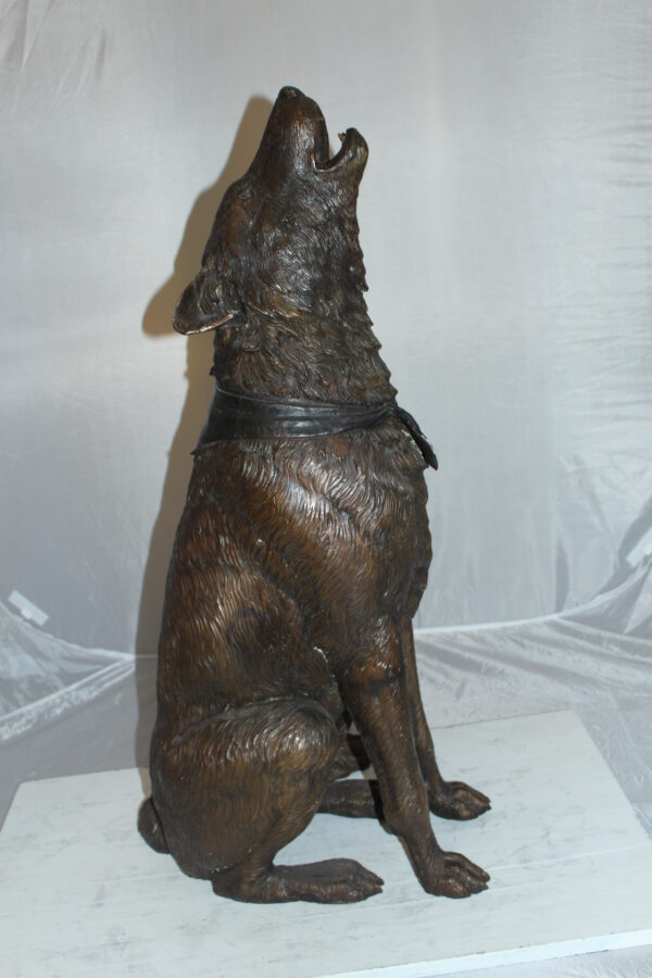 Howling Wolf Bronze Statue -  Size: 16"L x 20"W x 37"H.