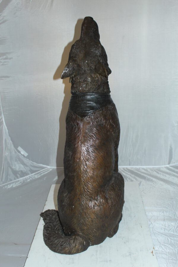 Howling Wolf Bronze Statue -  Size: 16"L x 20"W x 37"H.