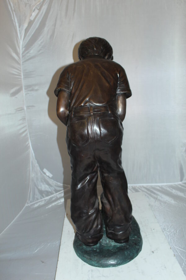 Boy plays golf Bronze Statue -  Size: 14"L x 18"W x 37"H.