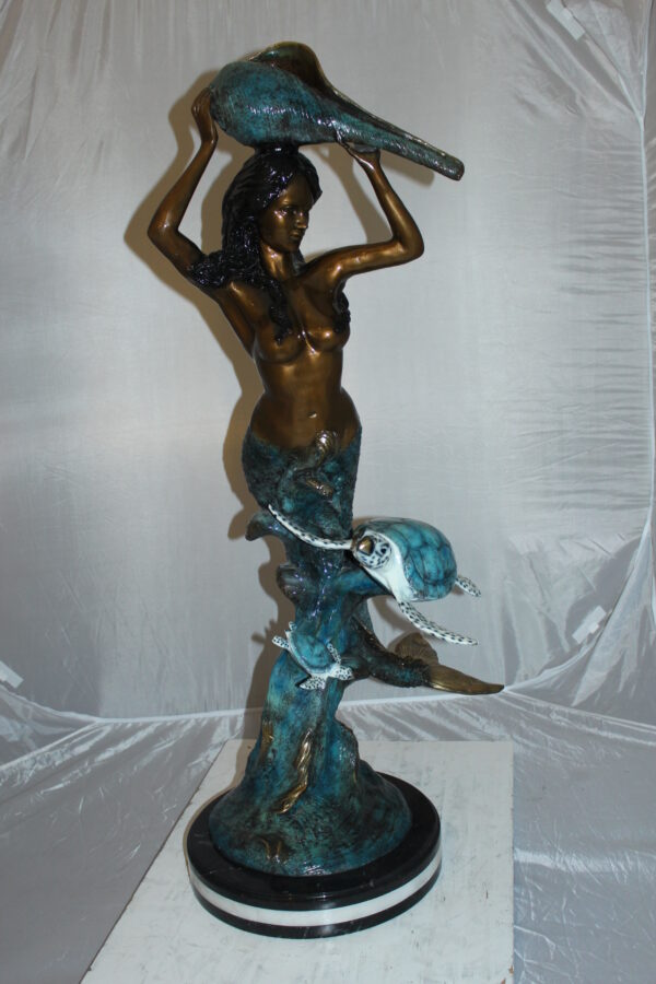 Mermaid 43 holding a shell fountain Bronze Statue -  Size: 14"L x 24"W x 43"H.